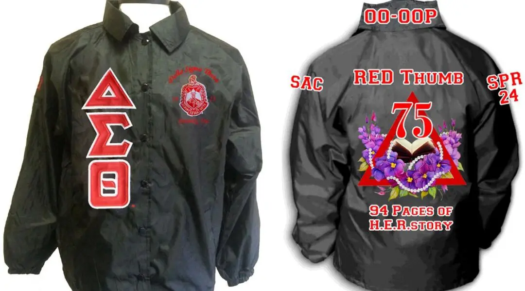 Black jacket with red and purple embroidery.